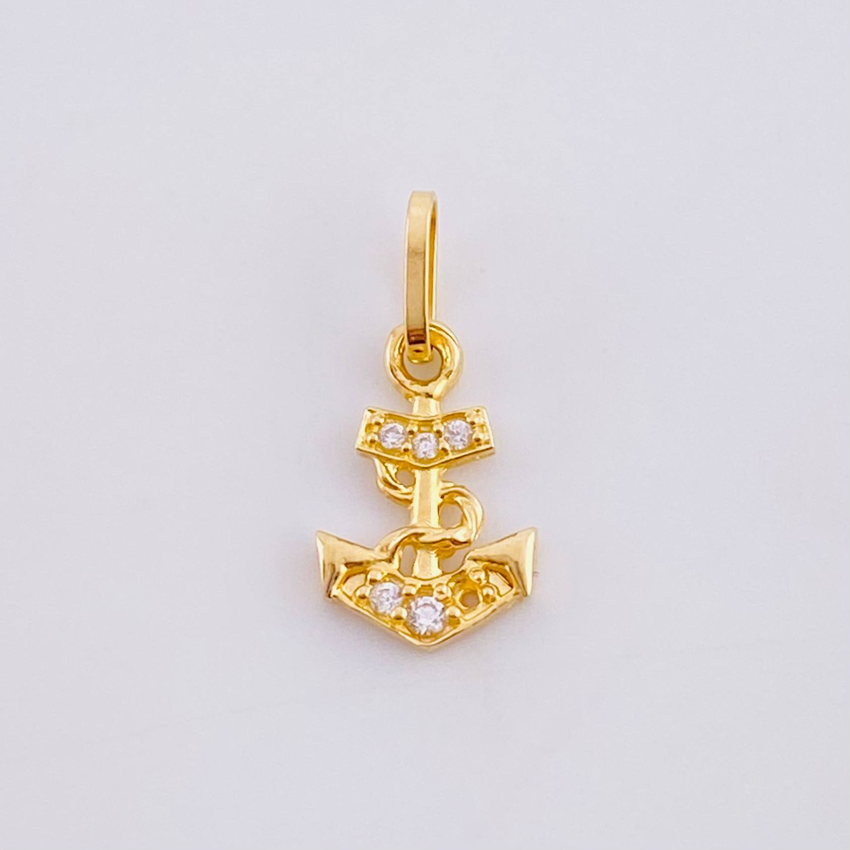 Dije Ancla 0.4gr / 1/2 in / Oro Amarillo 18K