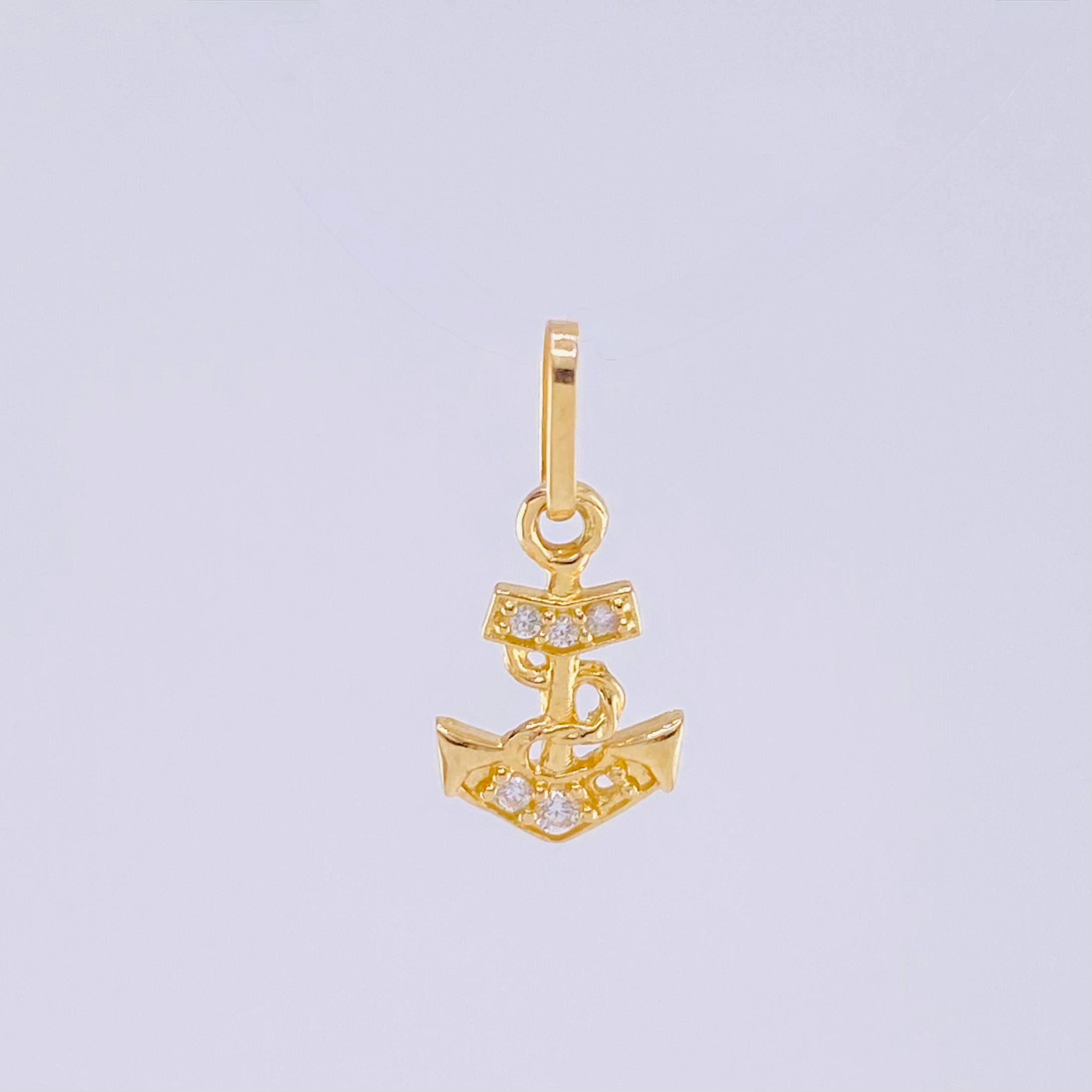 Dije Ancla 0.4gr / 1/2 in / Oro Amarillo 18K