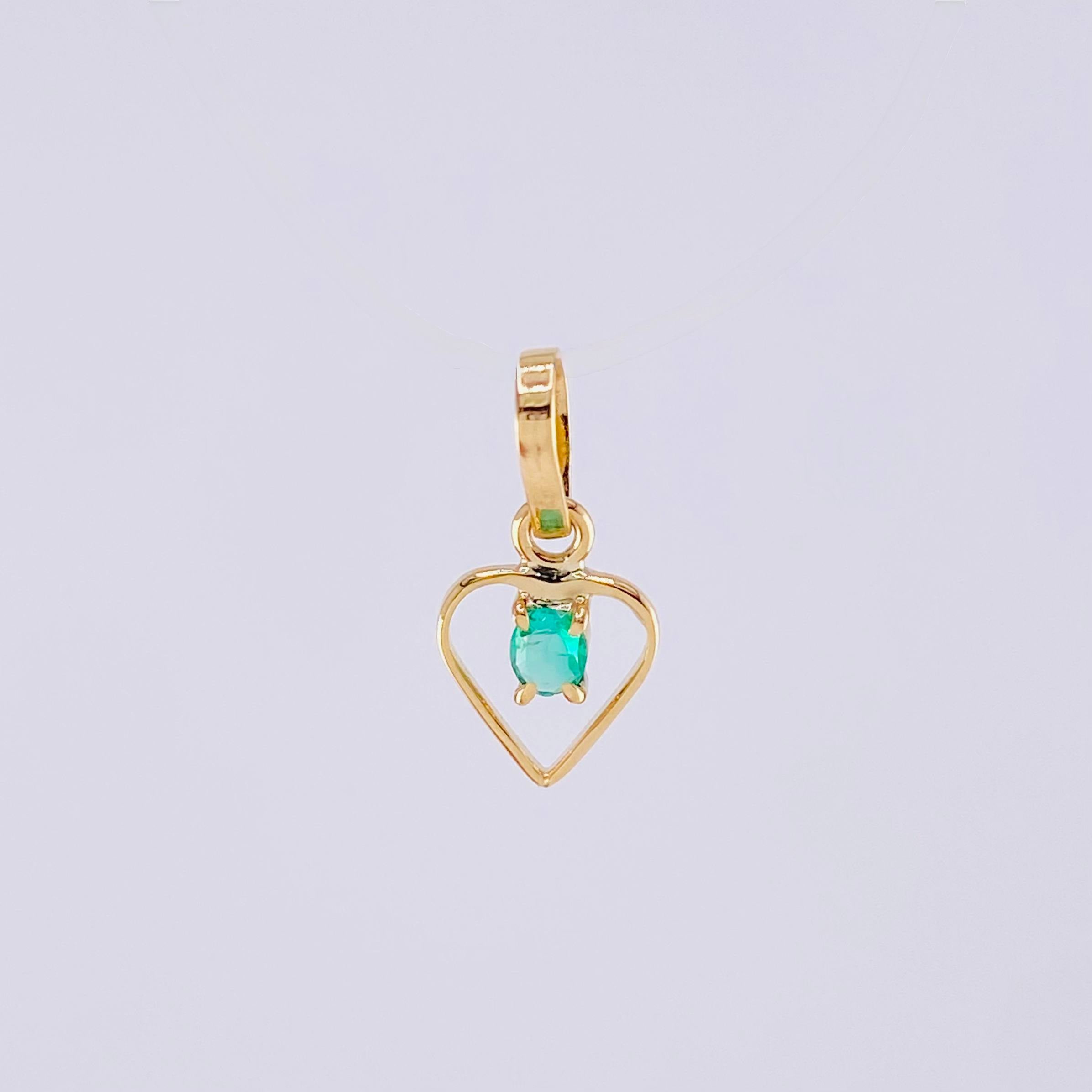 Dije Silueta Corazón Esmeralda 5pts 0.3g / 1/2 in Oro Amarillo 18K