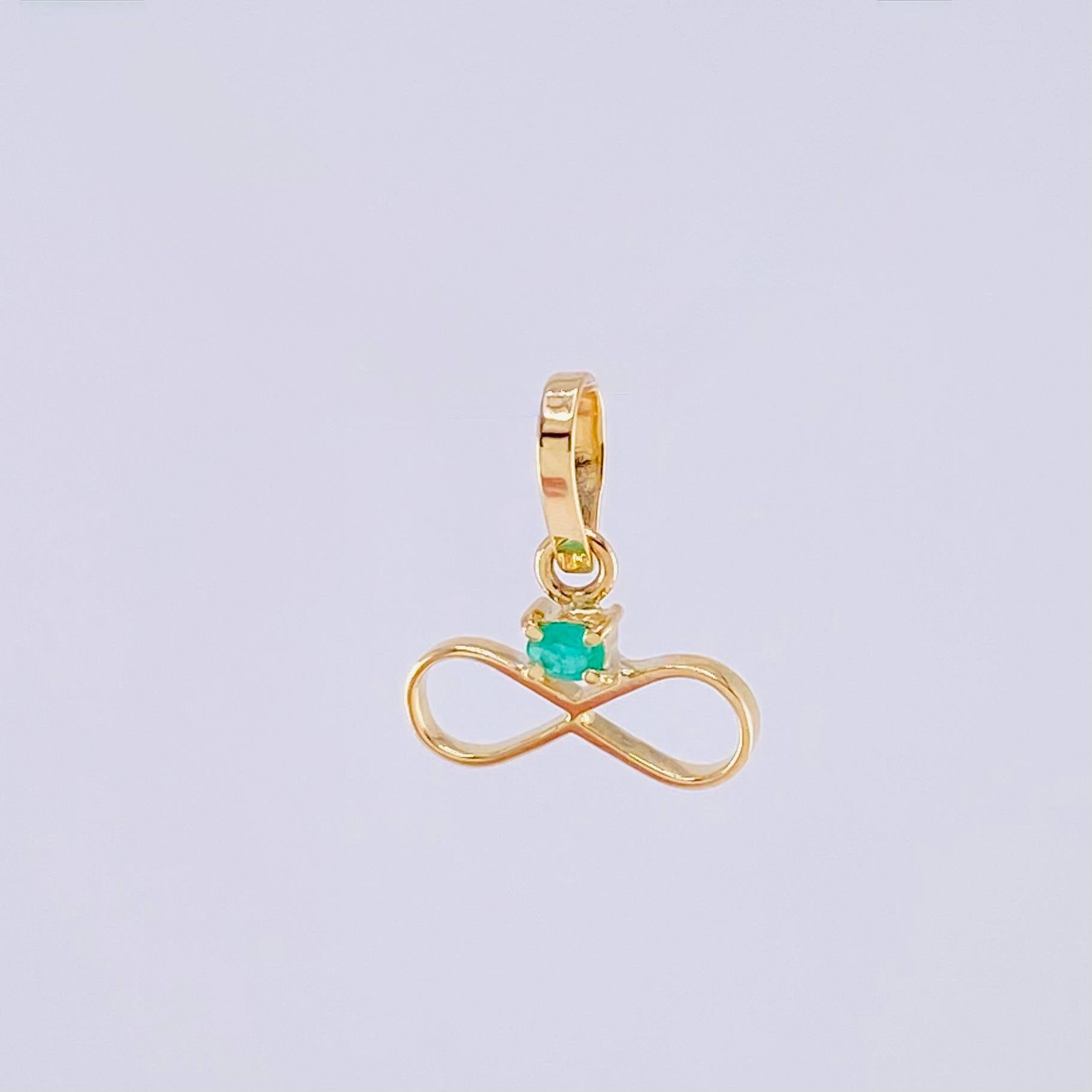 Dije Infinito Esmeralda 2pts 0.3g / 1/2 in Oro Amarillo 18K