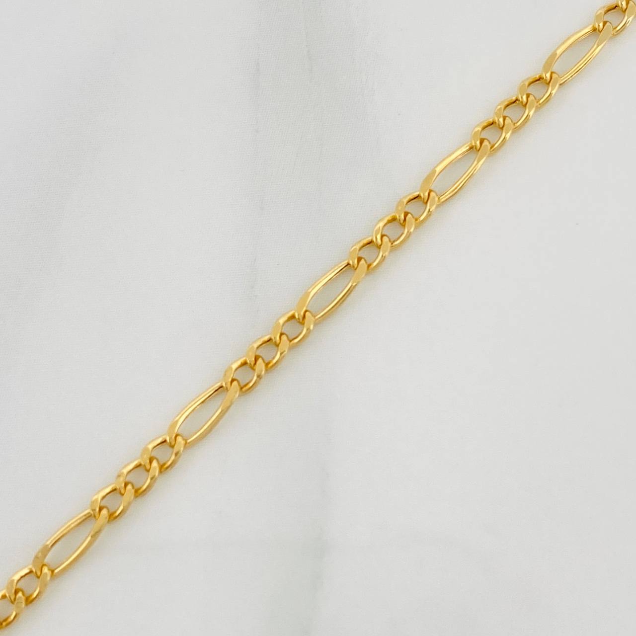 Pulso Figaro 1.2gr / 7 1/2 in / 2mm Oro Amarillo +1 18K %