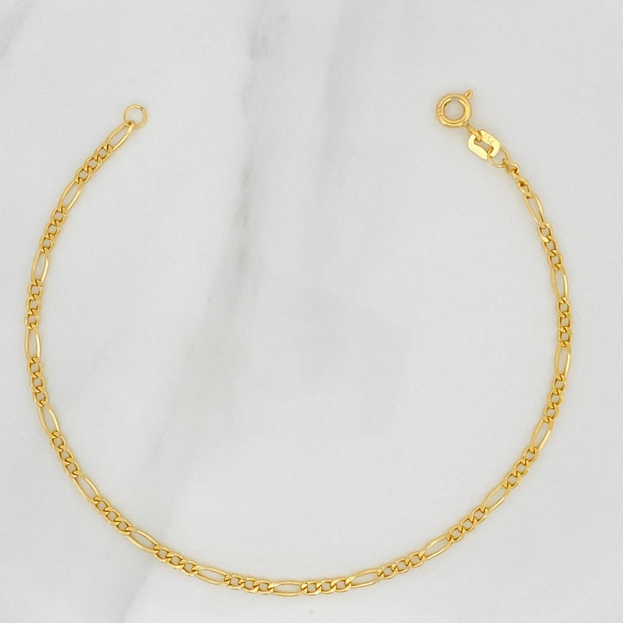 Pulso Figaro 1.2gr / 7 1/2 in / 2mm Oro Amarillo +1 18K %