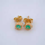 Topos Circulo Esmeralda 1.4gr / 1/2 in / Oro Amarillo 18K %