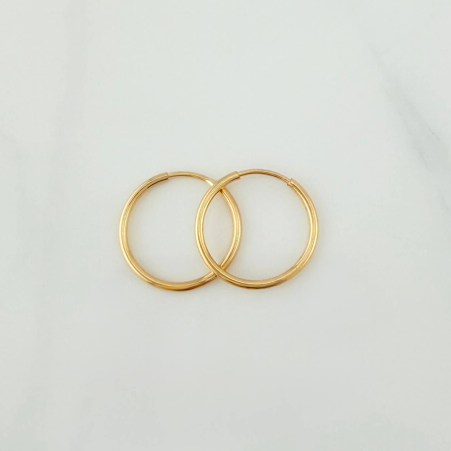 Candongas Aro 0.7 g / 1/2 in Oro Amarillo 18K