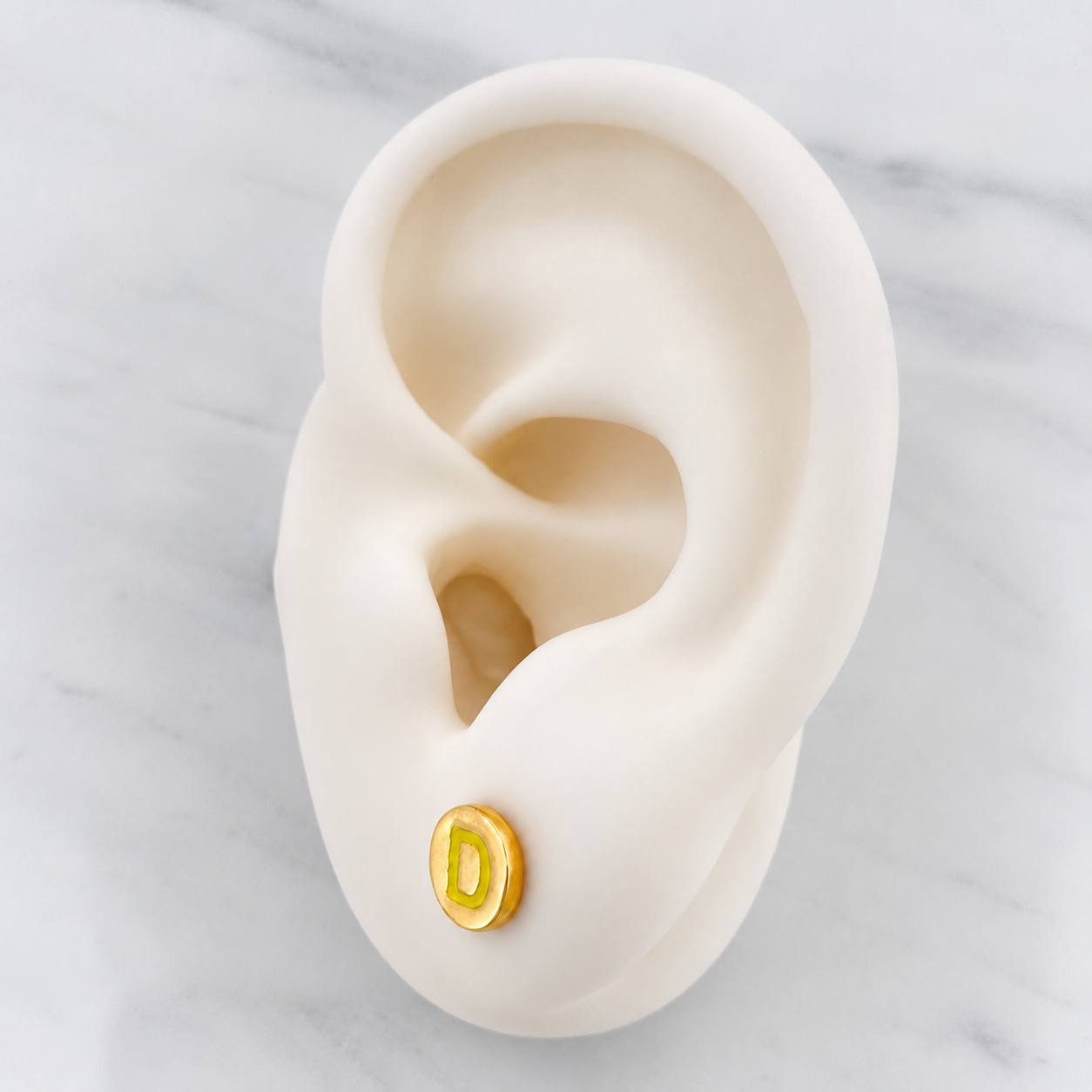 Topos Letra D 1.05g / in / 7.15mm Oro Amarillo 18K