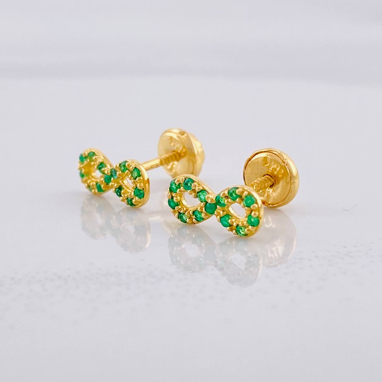Topos Infinito Esmeraldas 14pts 1.2g / in / 4.4mm Oro Amarillo 18K