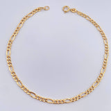Pulso Figaro 0.7gr / 7 1/2 in / 2mm Oro Amarillo +1 18K &