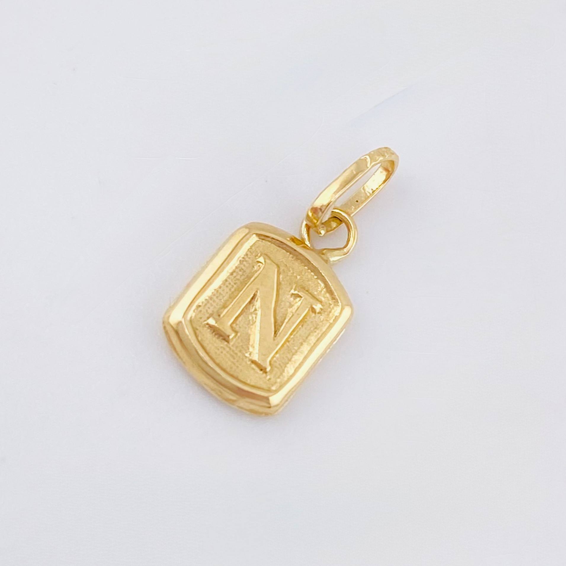 Dije Letra N 0.35g / 1/2 in Oro Amarillo 18K