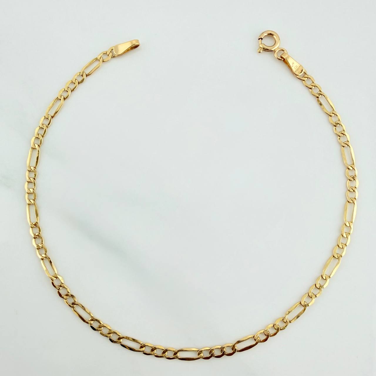 Pulso Figaro 1.2gr / 7 3/4 in / 2.5mm Oro Amarillo +1 18K %
