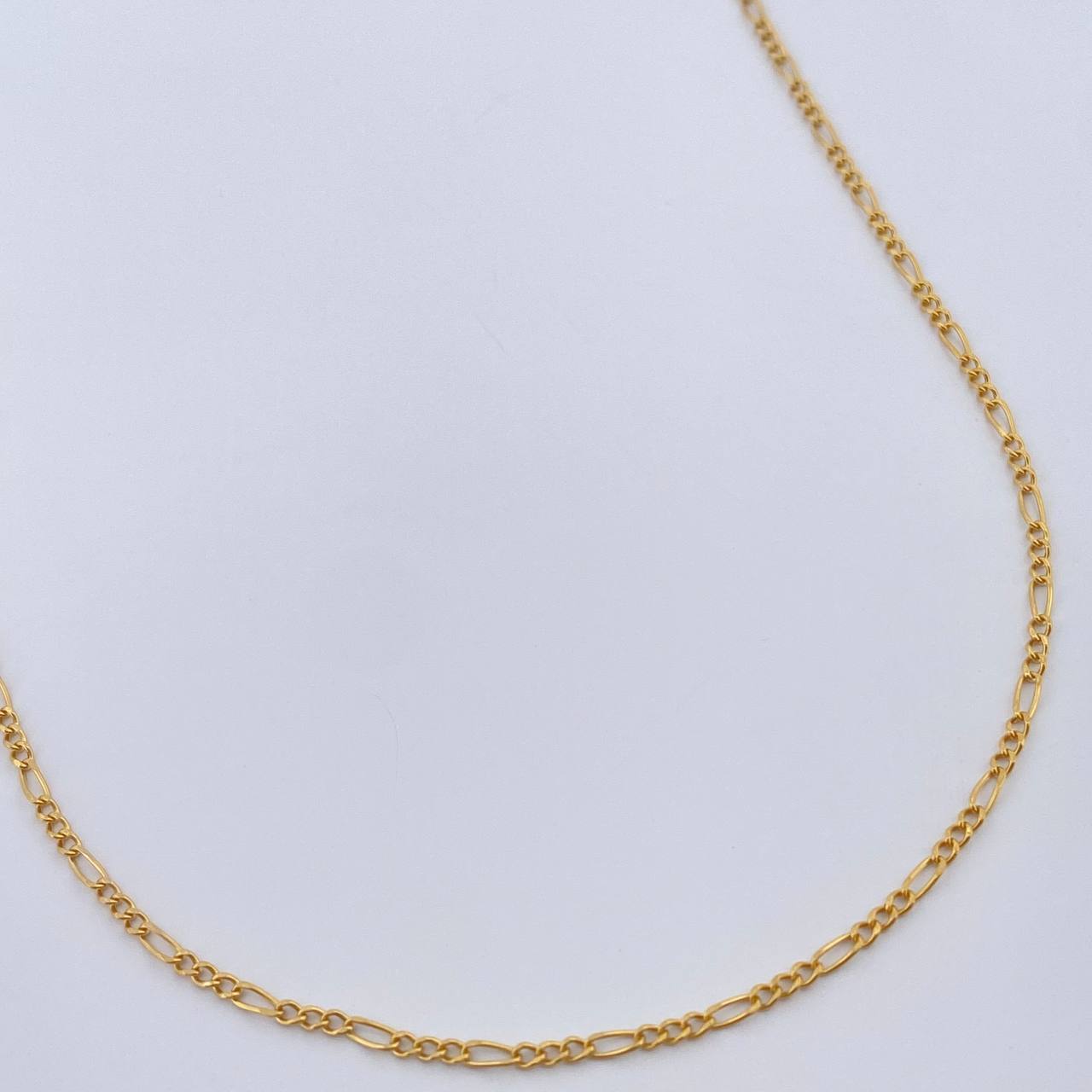 Cadena Figaro 1.1gr / 19 1/2 in / 1.3mm Oro Amarillo +1 18K $