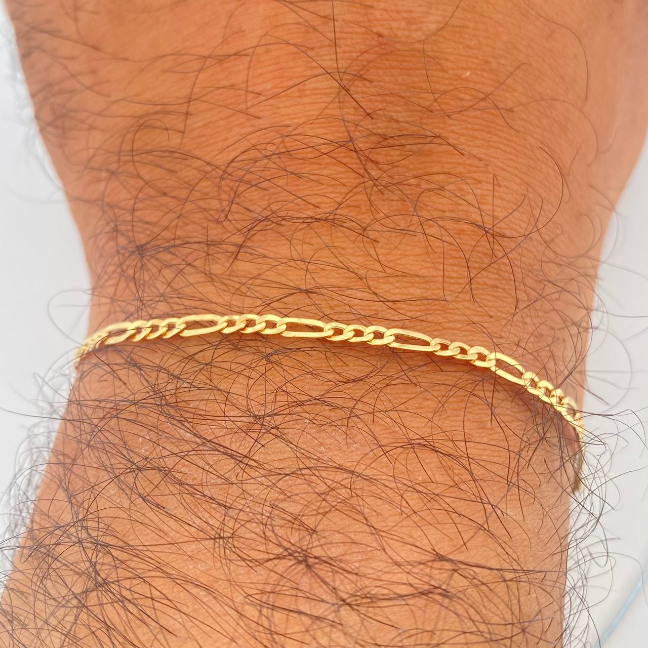 Pulso Figaro 0.7gr / 6 1/4 in / 2mm Oro Amarillo +1 18K %