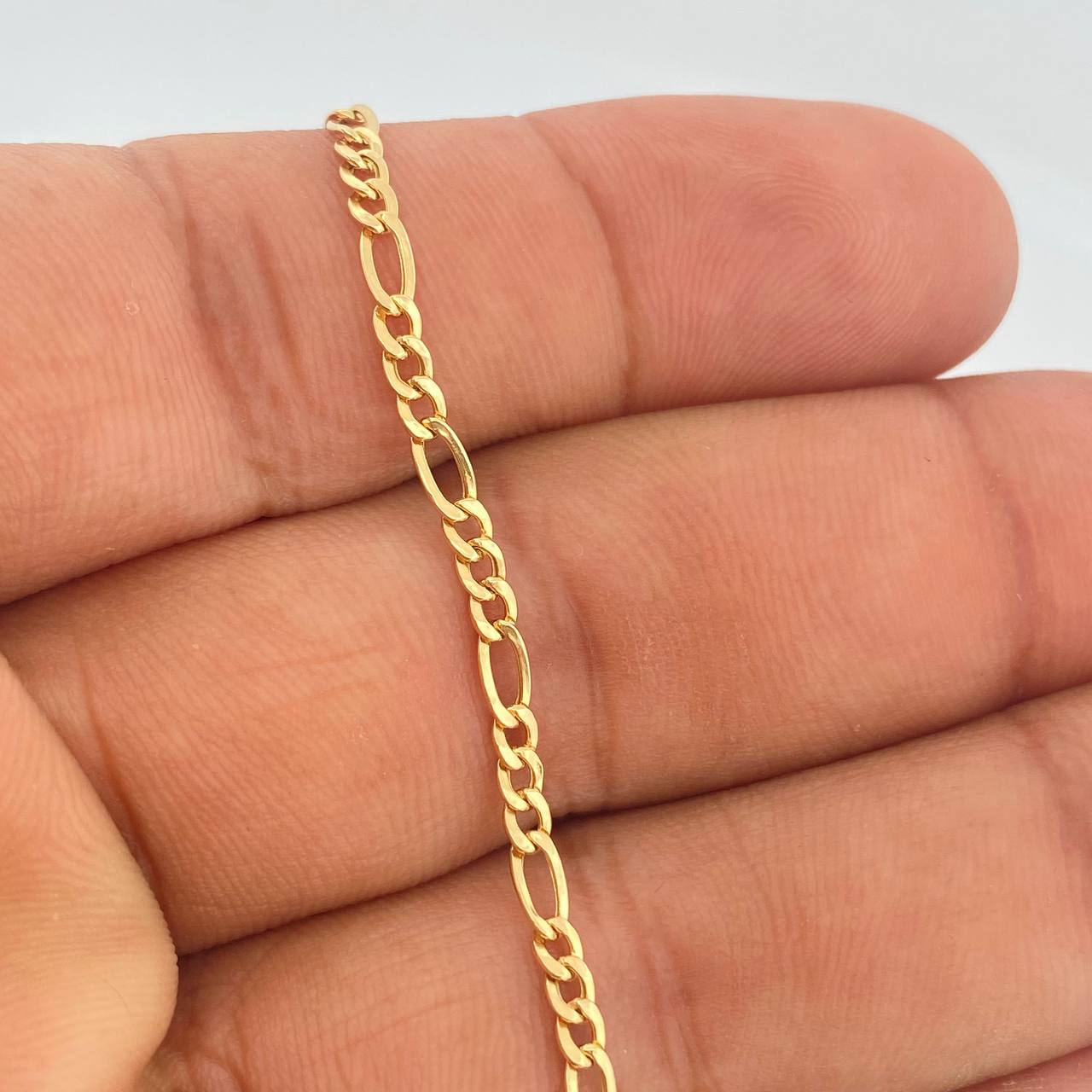 Pulso Figaro 0.65gr / 7 1/4 in / 2mm Oro Amarillo +1 18K %