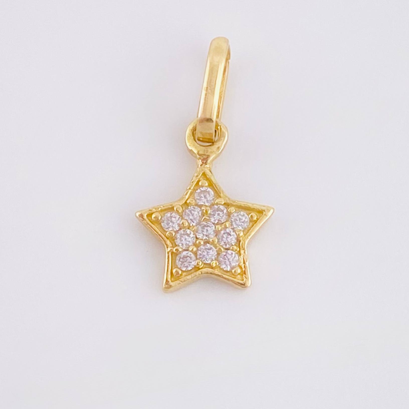 Dije Estrella Tupida 0.6gr / 1/2 in / Oro Amarillo 18K *