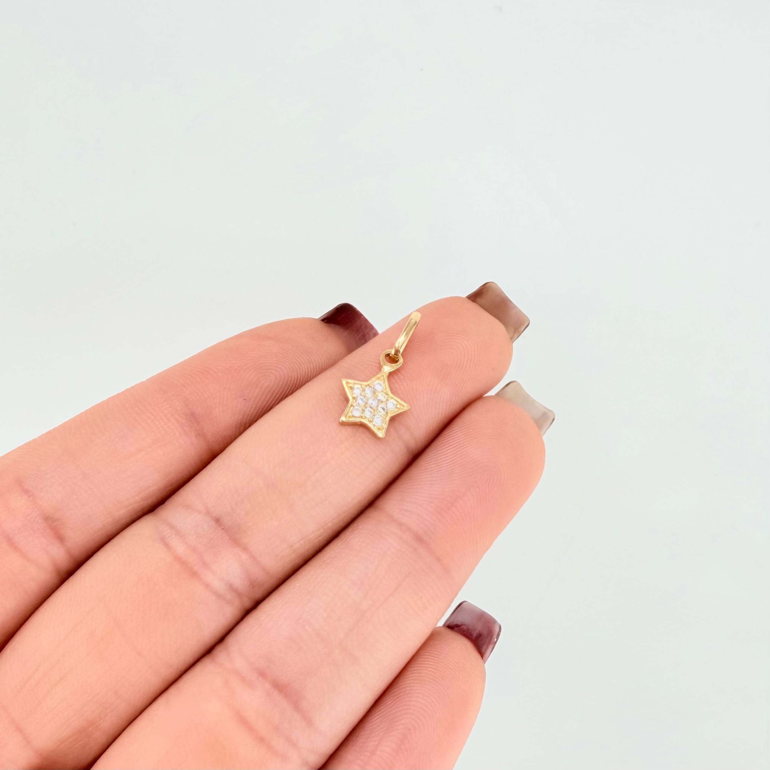 Dije Estrella Tupida 0.6gr / 1/2 in / Oro Amarillo 18K *