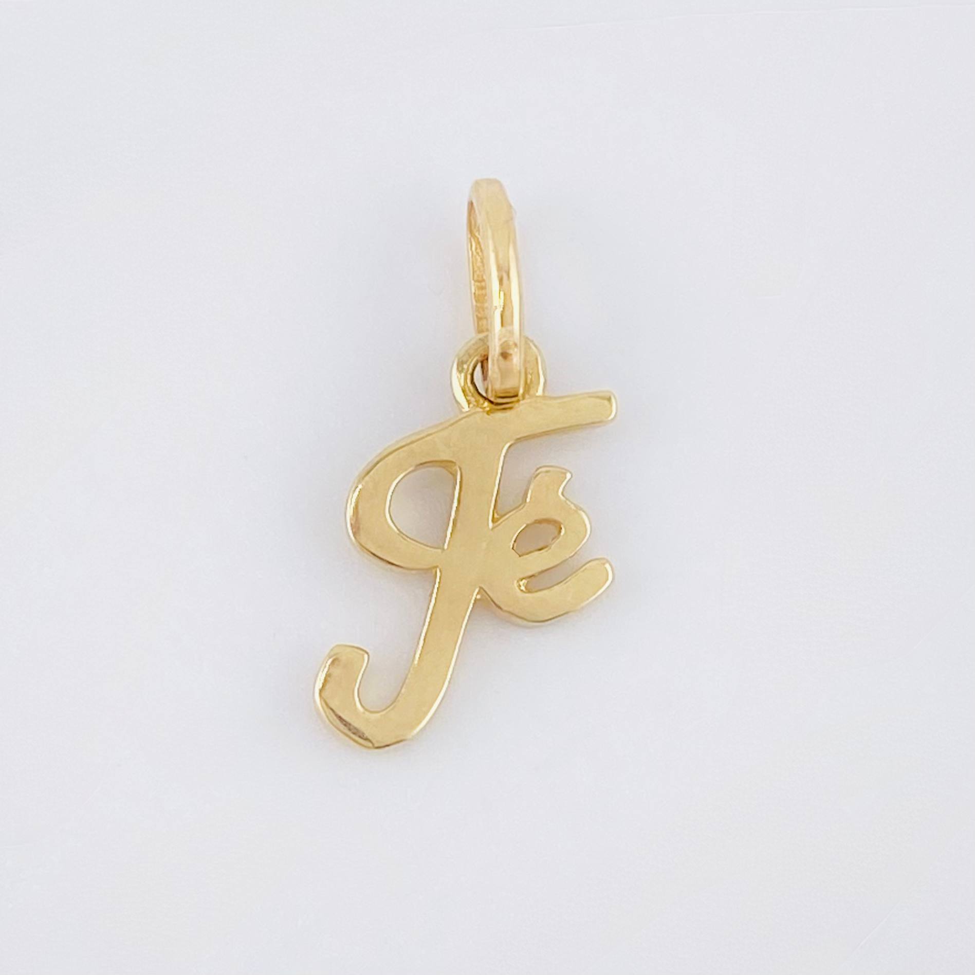 Dije Fe 0.85gr / 3/4 in / Oro Amarillo 18K *