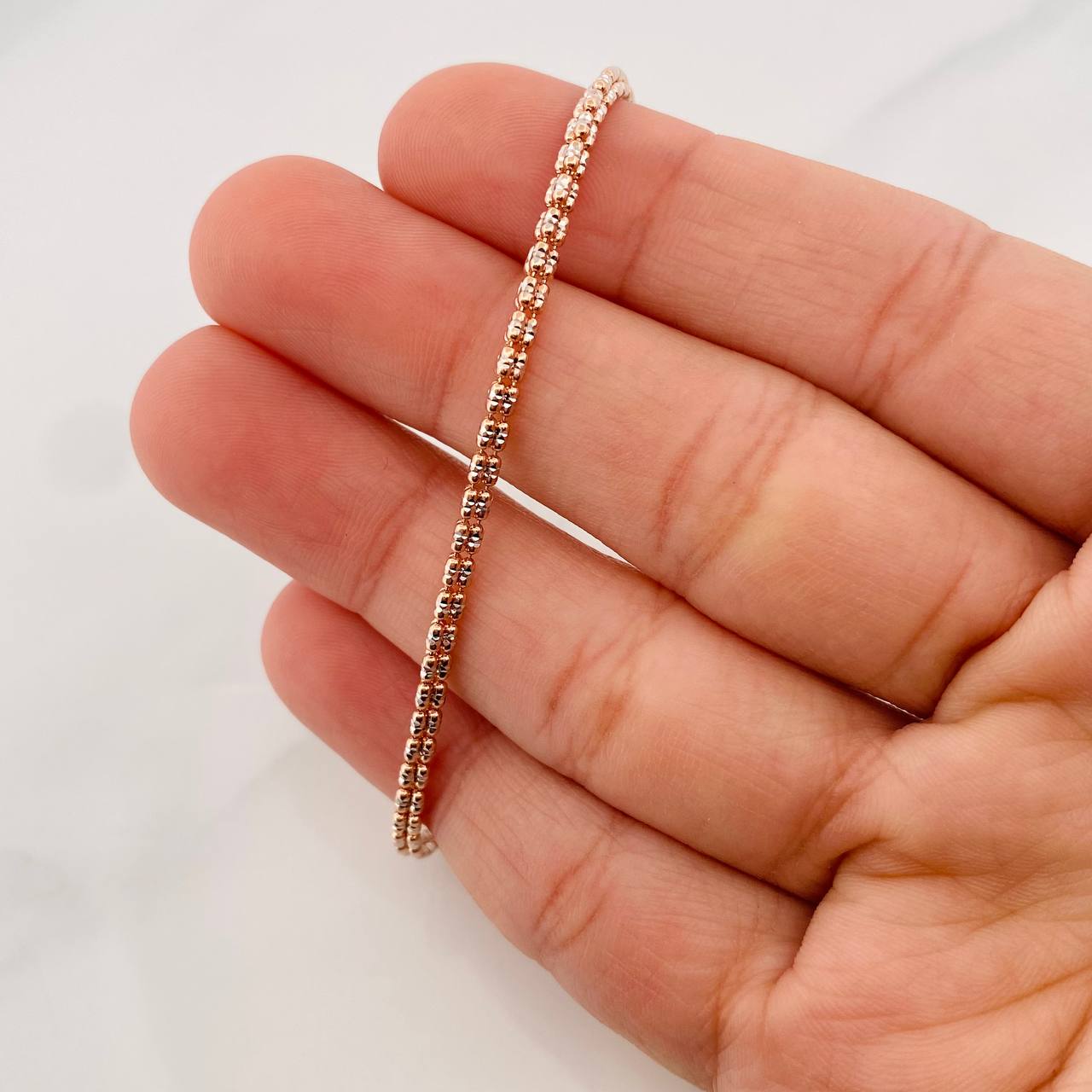 Pulso Ice 4.5g / 7 3/4 in / 2.5mm Dos Oros Blanco Rosa 18K
