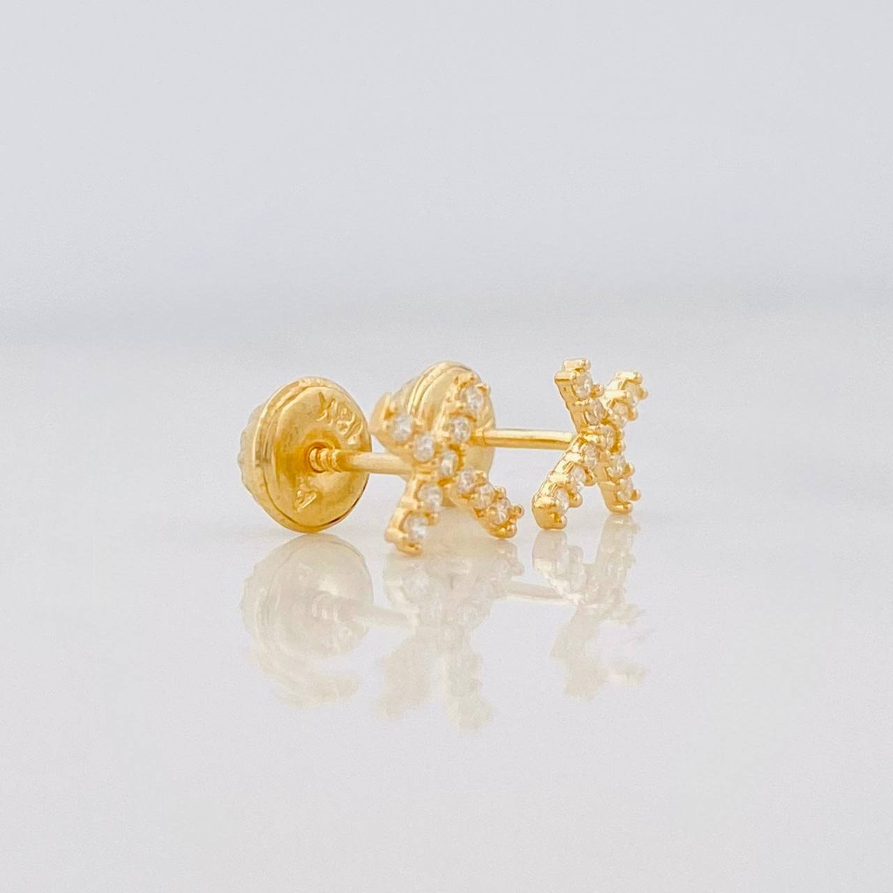 Topos Cruz 0.65g / in / 6.4mm Oro Amarillo 18K
