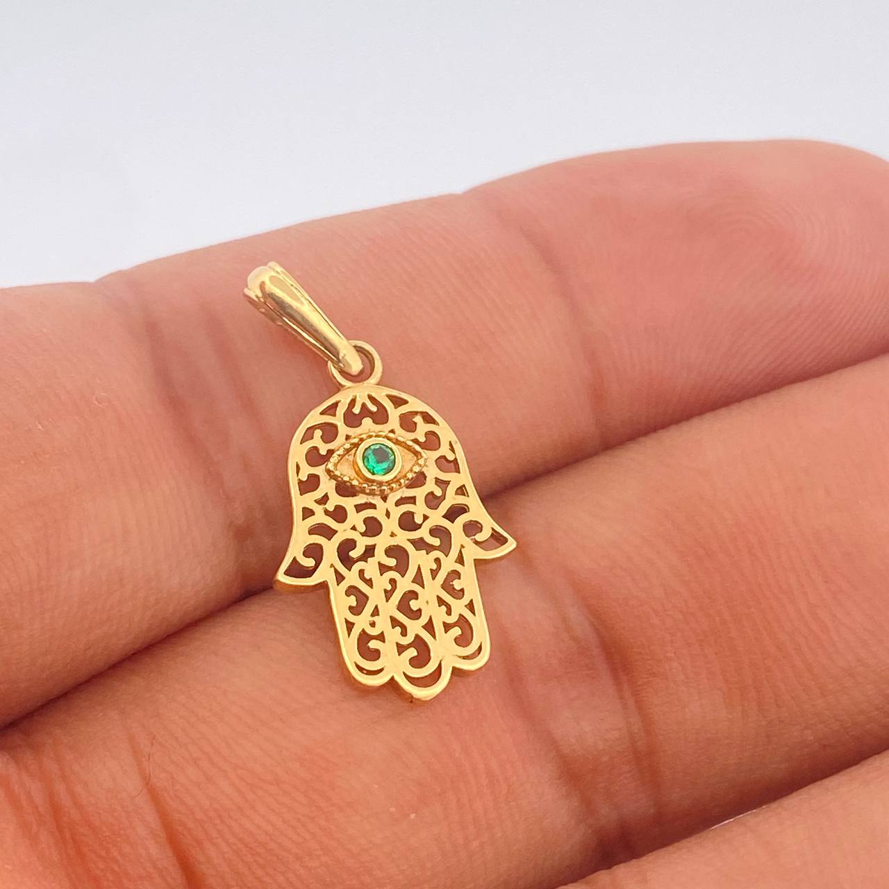 Dije Mano Hamsa 1.3gr / 1 in / Oro Amarillo 18K $