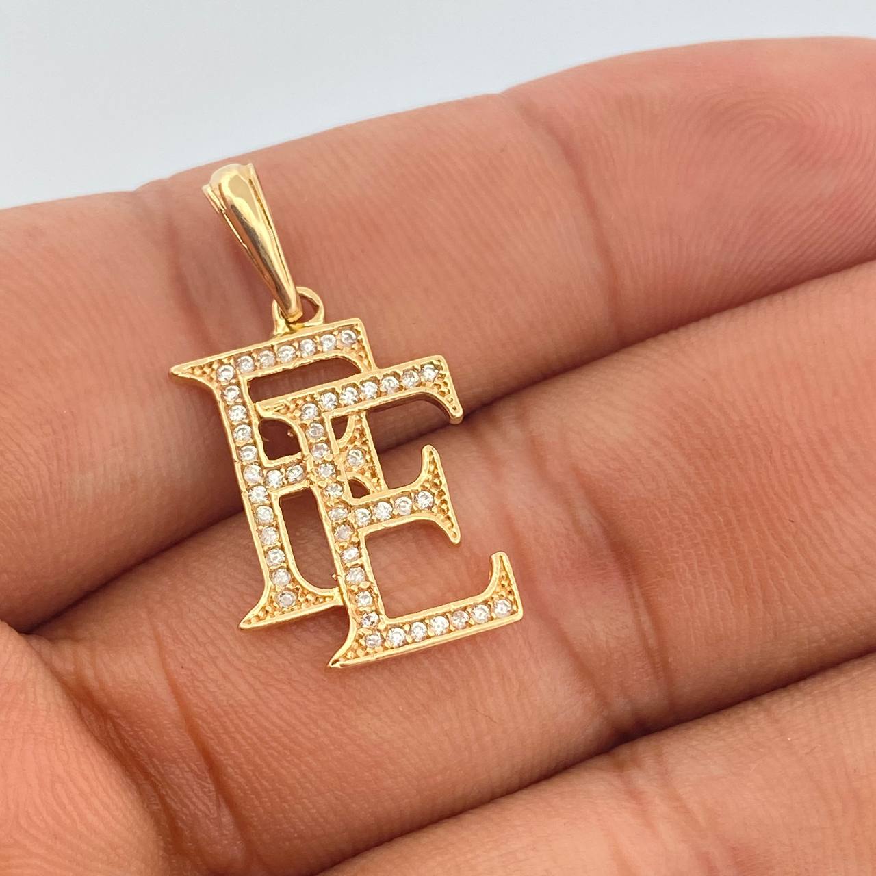 Dije Fe 2.3gr / 1 1/4 in / Oro Amarillo 18K $