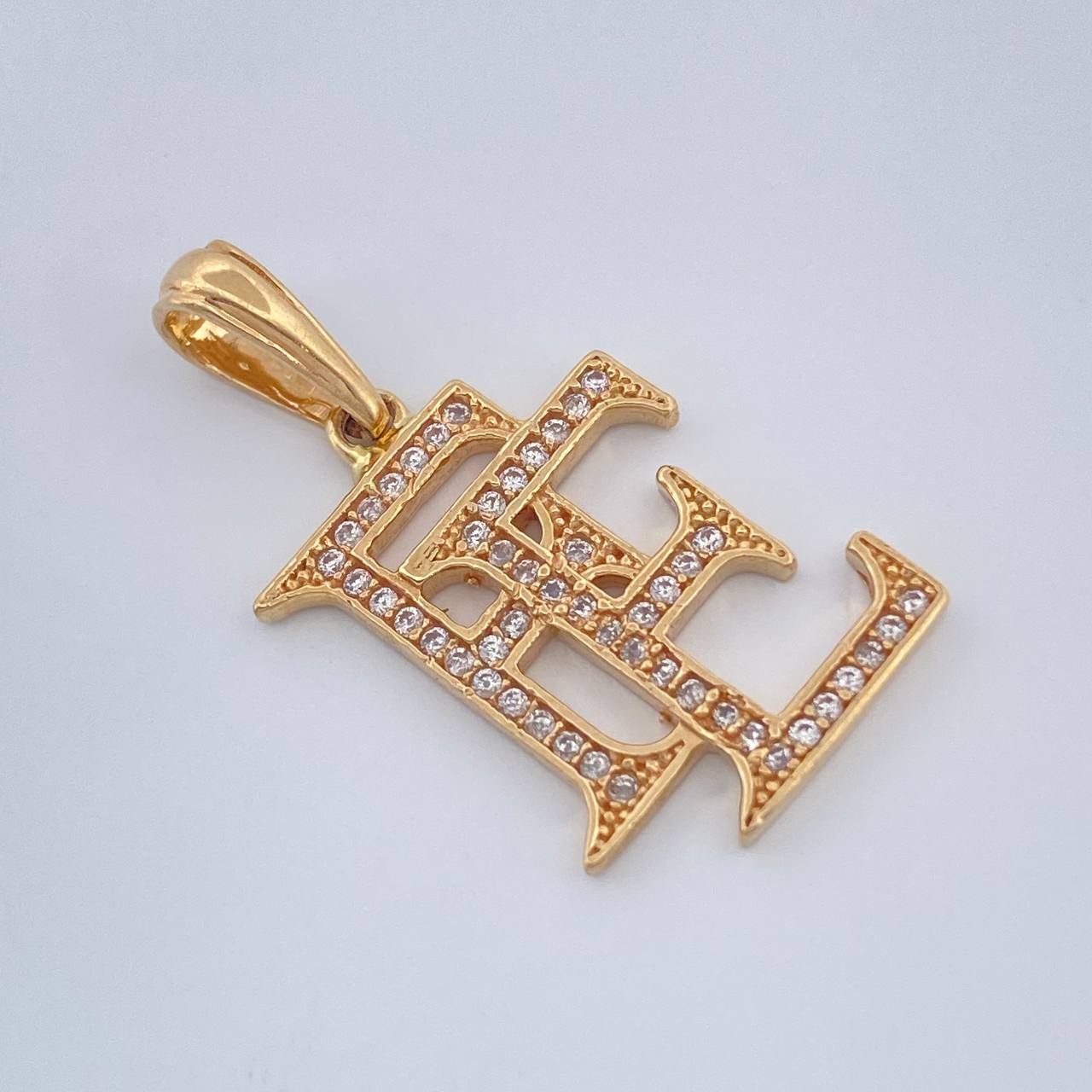 Dije Fe 2.3gr / 1 1/4 in / Oro Amarillo 18K $