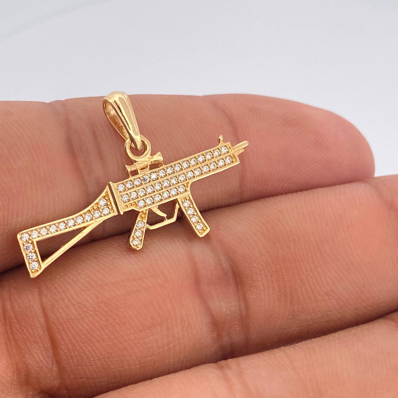 Dije Arma 2.5gr / 1 in / Oro Amarillo 18K $