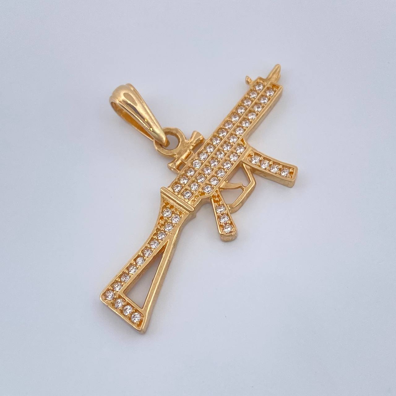 Dije Arma 2.5gr / 1 in / Oro Amarillo 18K $