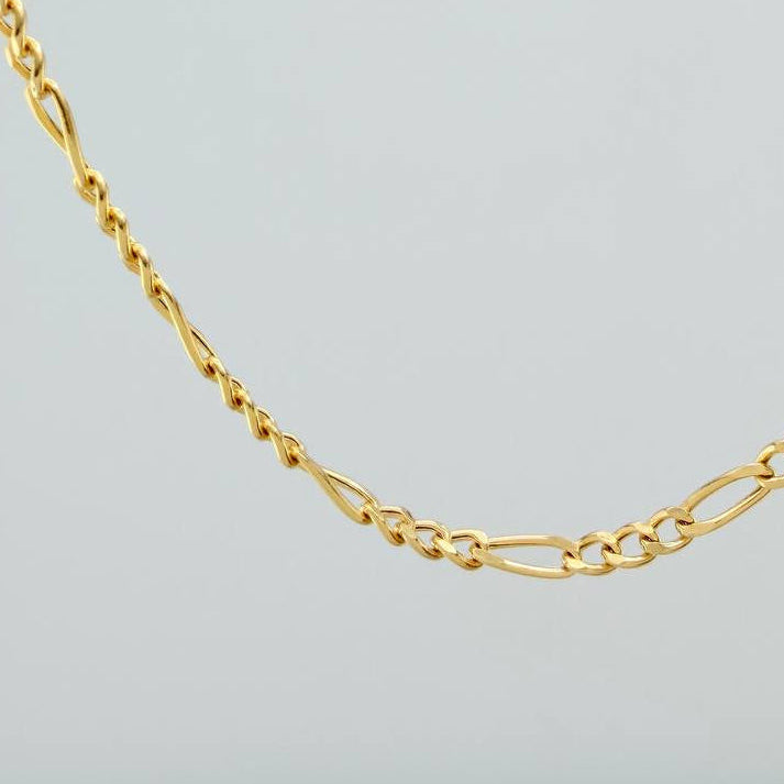 Cadena Figaro 3.1gr / 21 1/2 in / 2.05mm Oro Amarillo +1 18K $