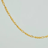 Cadena Figaro 1.65gr / 21 3/4 in / 1.37mm Oro Amarillo +1 18K $