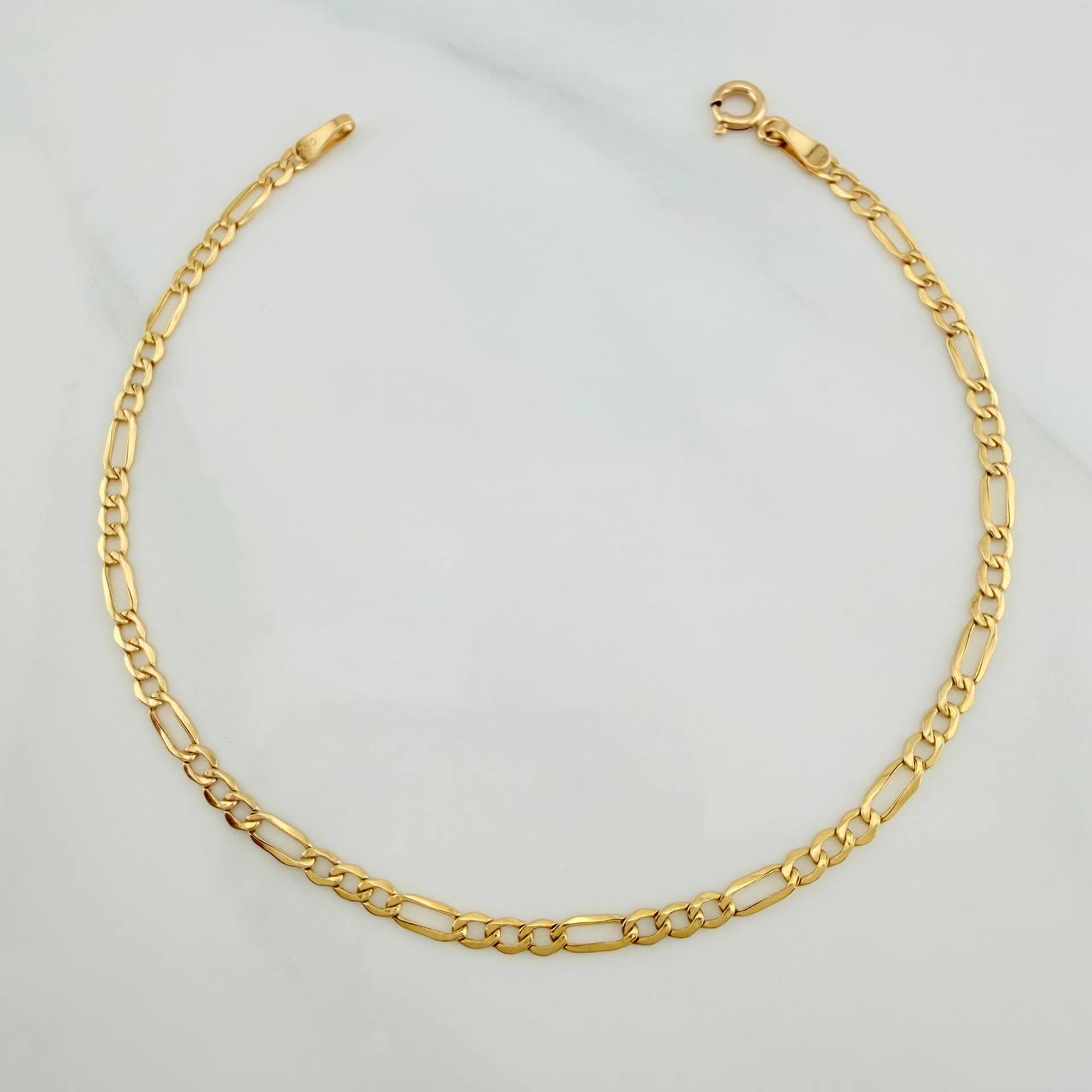 Pulso Figaro 1.2gr / 8 in / 2.55mm Oro Amarillo +1 18K $