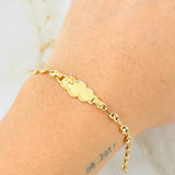 Pulso Bebé GC Placa Nube Cruz 1.9gr / 5 1/2 in / 3.6mm Oro Amarillo 18K