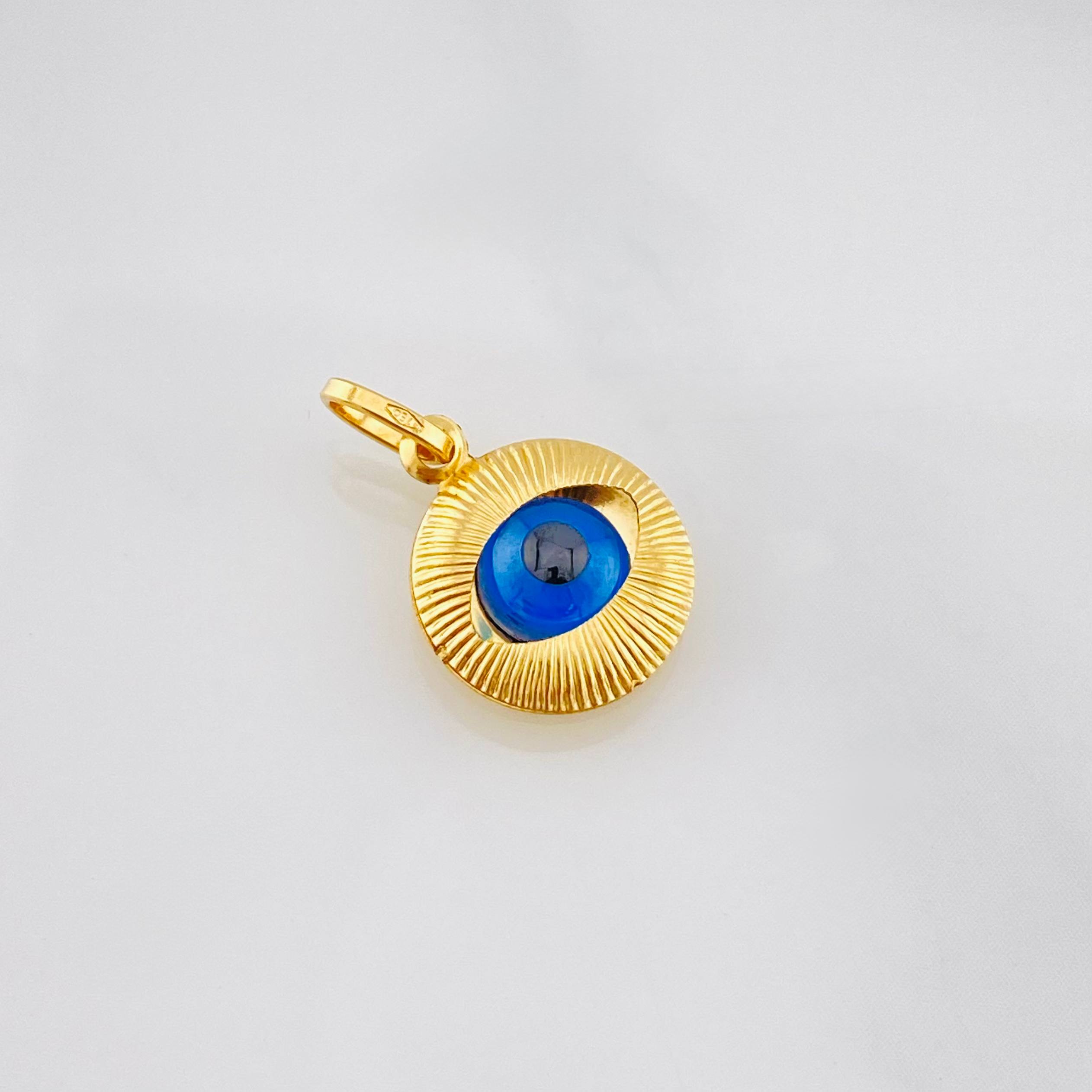 Dije Ojo Turco 0.95g / 1/2 in Oro Amarillo 18K