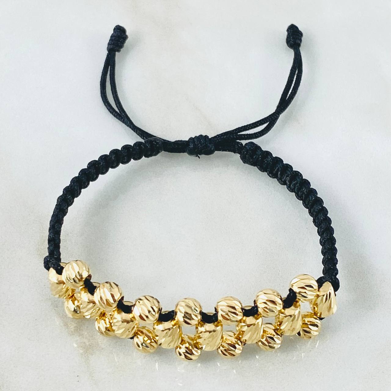 Pulsera Negra Bolas Cilindros 3.9gr / 5mm Oro Amarillo 18K *