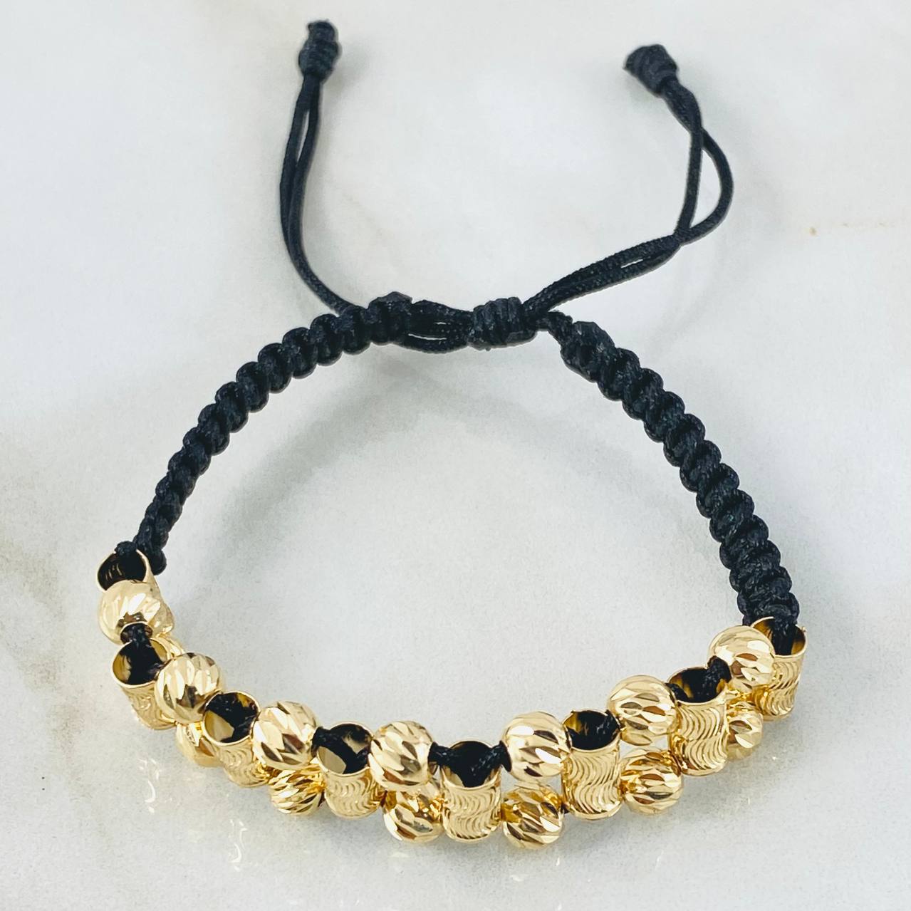 Pulsera Negra Bolas Cilindros Ola 3.1gr / 5mm Oro Amarillo 18K *