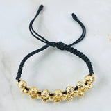 Pulsera Negra Bolas Cilindros 4.75gr / 6mm Oro Amarillo 18K ©