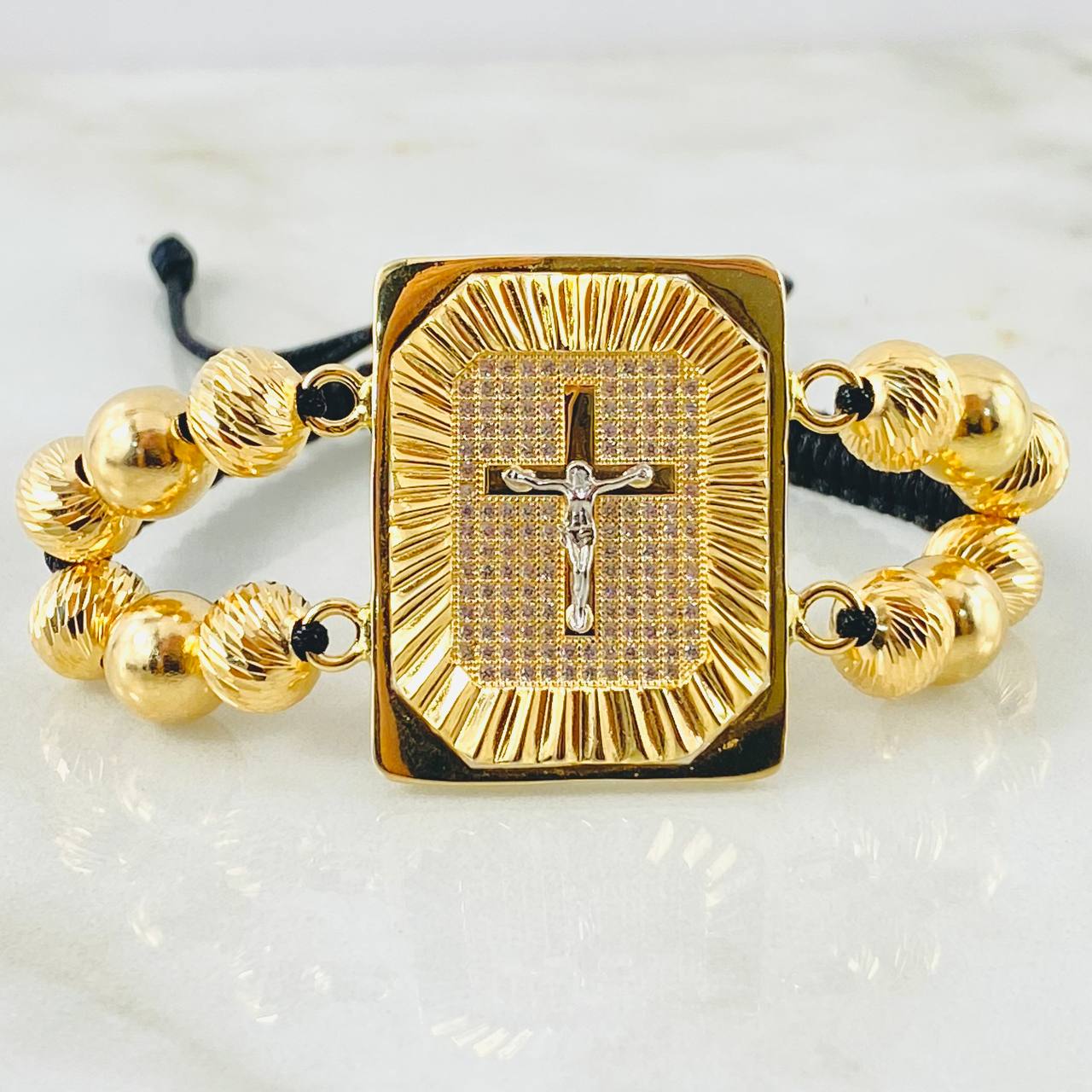 Pulsera Negra Herraje Crúz Recuadro 14gr / 8mm Dos Oros Amarillo Blanco 18K ©