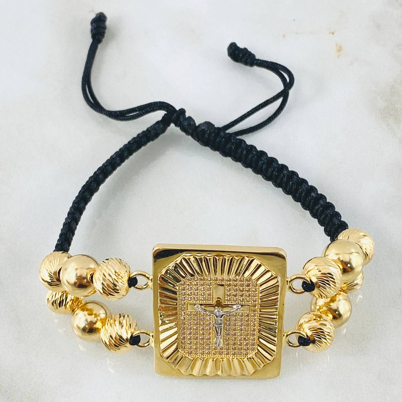 Pulsera Negra Herraje Crúz Recuadro 14gr / 8mm Dos Oros Amarillo Blanco 18K ©