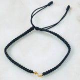 Pulsera Negra Herraje Retazo GC 0.2gr / 3mm Oro Amarillo 18K ©