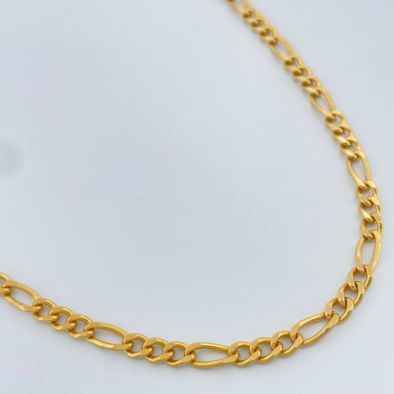 Cadena Figaro 9.6gr / 23 1/2 in / 3.8mm Oro Amarillo +1 18K %