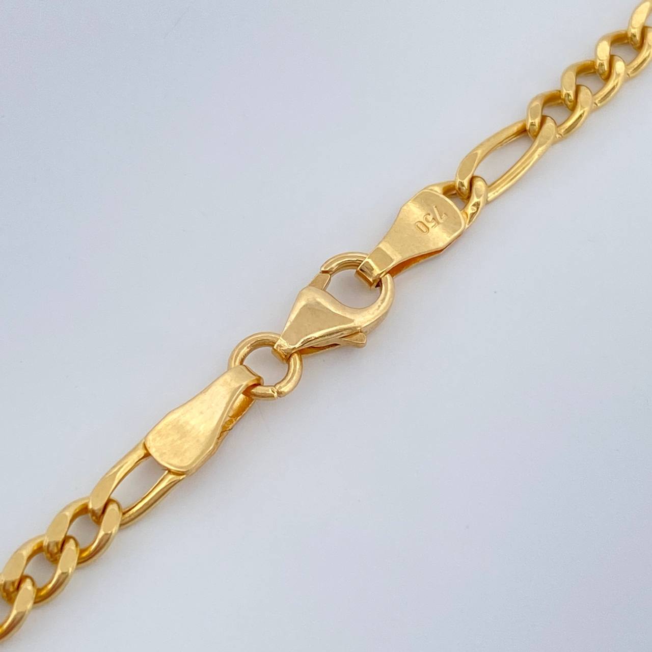 Cadena Figaro 9.6gr / 23 1/2 in / 3.8mm Oro Amarillo +1 18K %