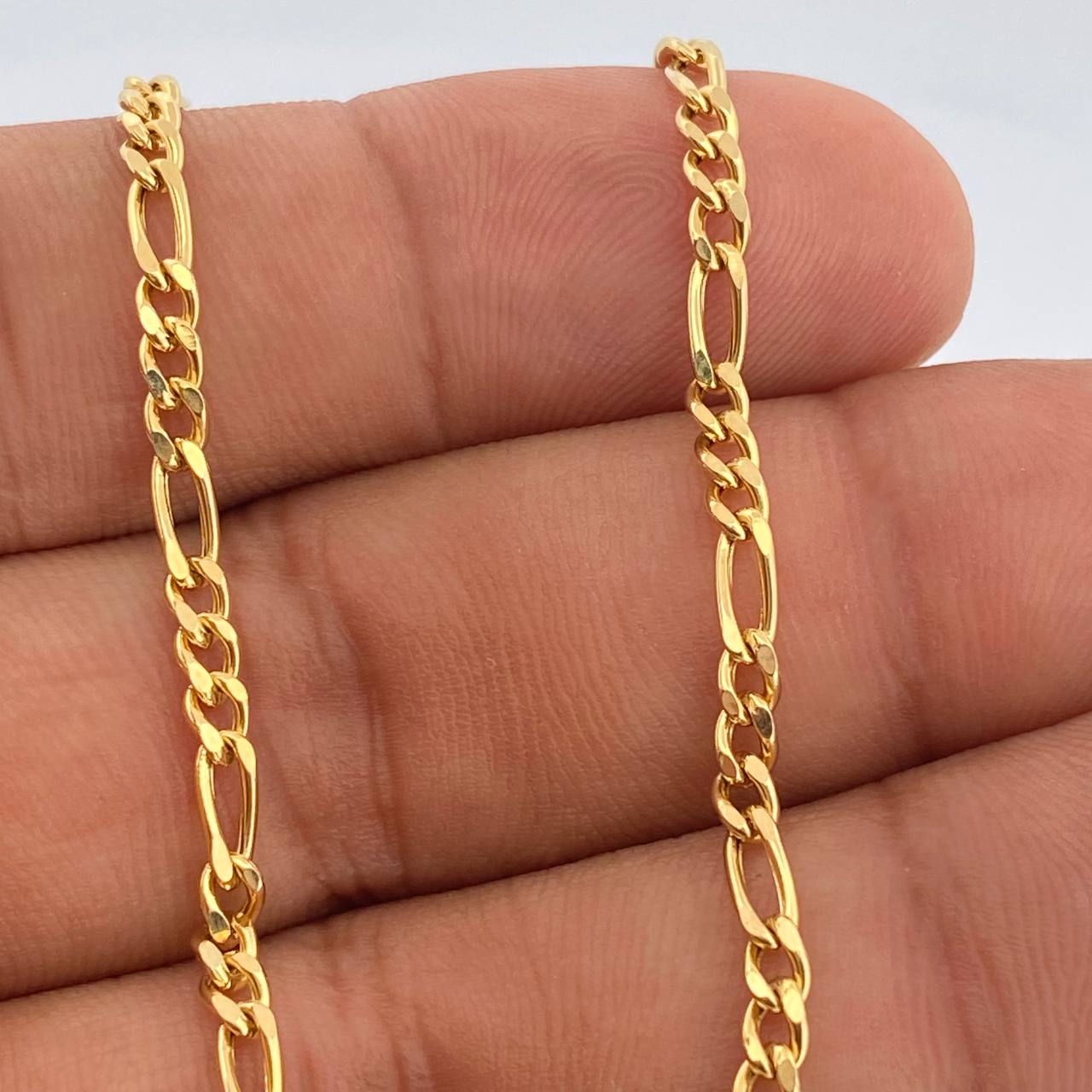 Cadena Figaro 9.6gr / 23 1/2 in / 3.8mm Oro Amarillo +1 18K %