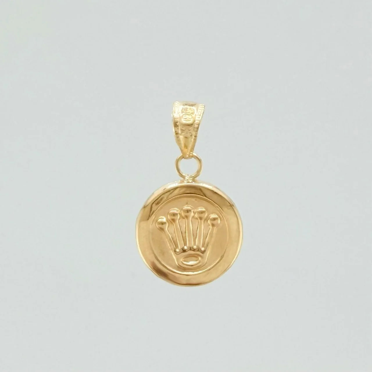 Dije Corona 0.85g / 3/4 in Oro Amarillo 18K