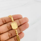 Pulsera Tejida Caqui Placa Cuadrada Punteada Oro Amarillo 18K