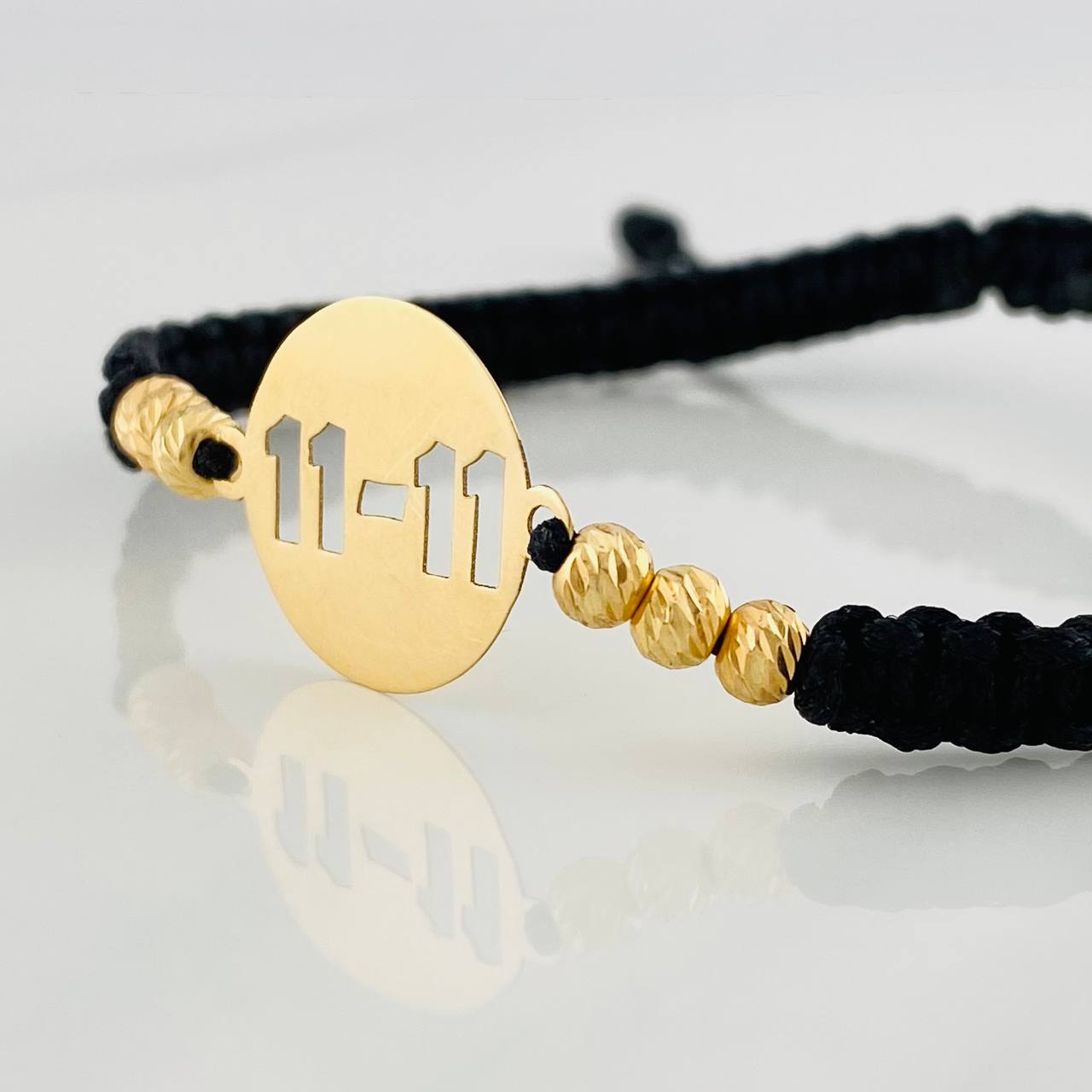 Pulsera Tejida Negra 11-11 Oro Amarillo 18K