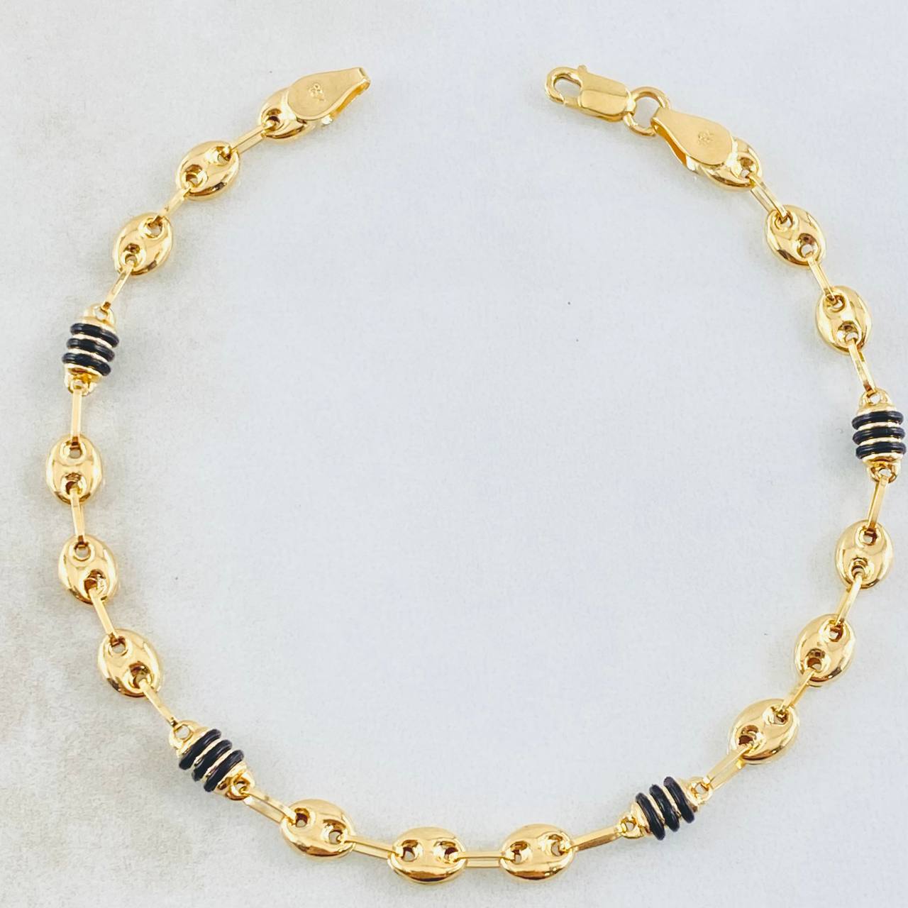 Bracelet Gc Barrel Black Rubbers 3.4gr / 7 in / 4.5mm 18K Yellow Gold