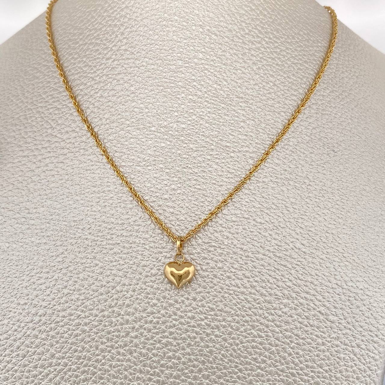 Set Cadena y Dije Lazo + Corazon 1.35gr / 15 3/4 in / Oro Amarillo 18K $