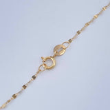 Set Chain and Mirror Flower Pendant + Cross 0.6gr / 17 1/2 in / Yellow Gold 18K $