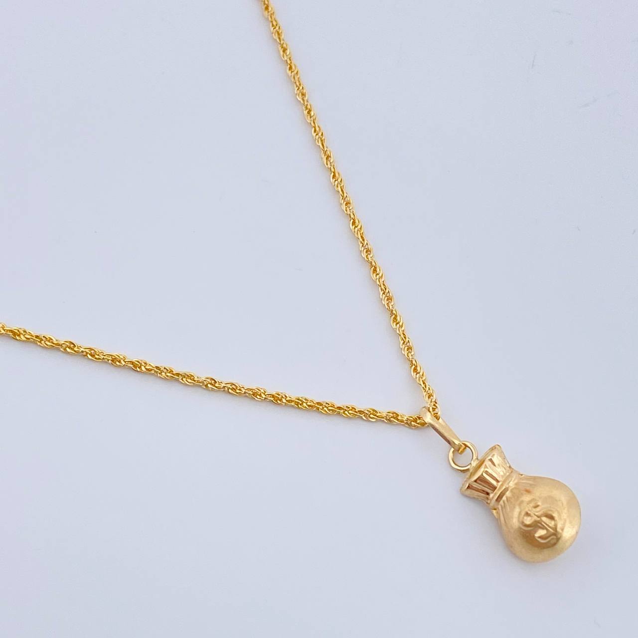 Set Rope Chain and Pendant + Money Bag 1.35gr / 17 3/4 in / 18K Yellow Gold $