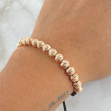 Pulsera Negra Bolas 6mm Diamantadas 20und Oro Rosa 18K (A.C)