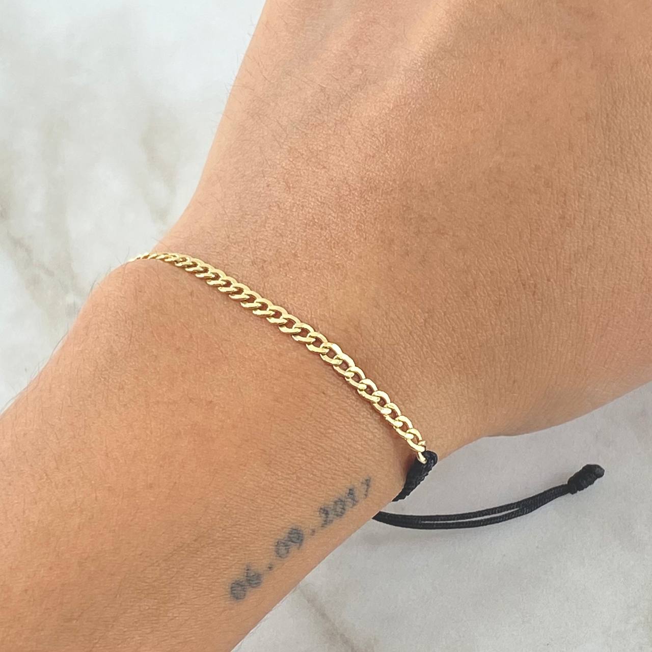 Pulsera Negra Retazo Cubano 0.6gr / 2.8mm Oro Amarillo 18K