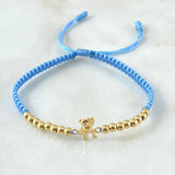 Pulsera Azul Herraje Oso Manito Arriba 1.15gr / 3mm Bolas Lisas 16und Oro Amarillo 18K *